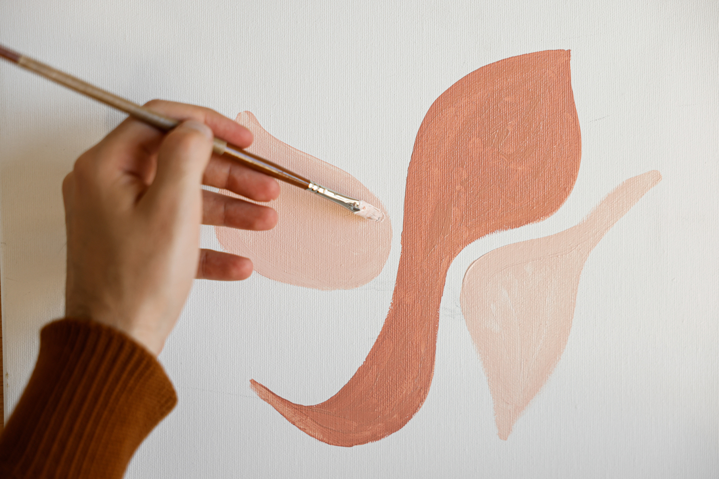 A Person Painting on a Canvas