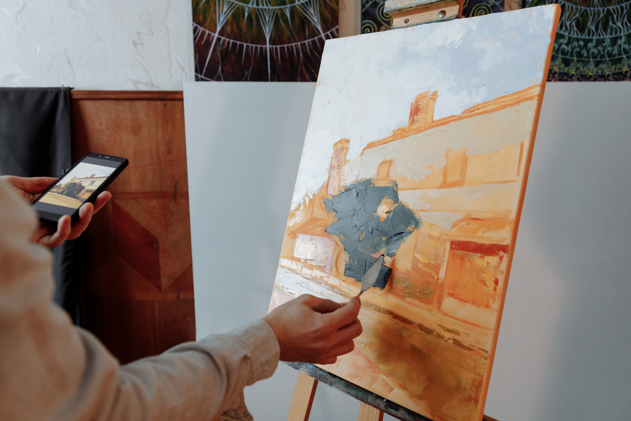 A Person Painting on a Canvas
